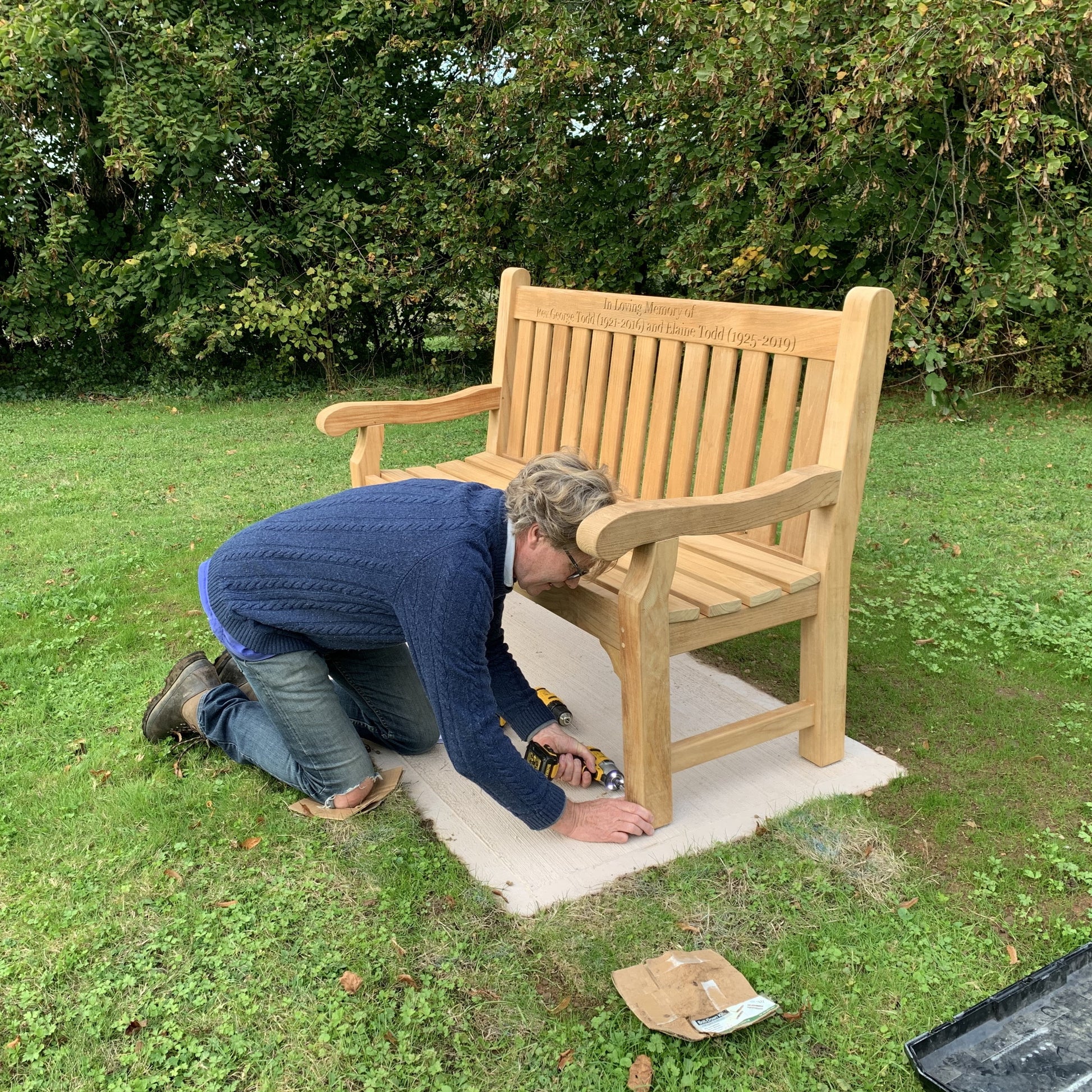 Installing a memorial bench with anchors to concrete